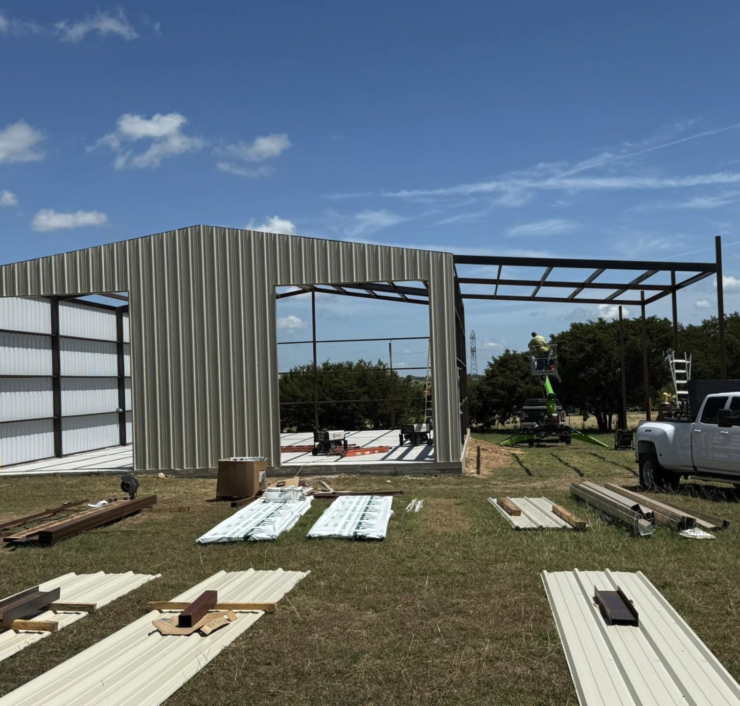 Wall panels going up on a steel frame shop